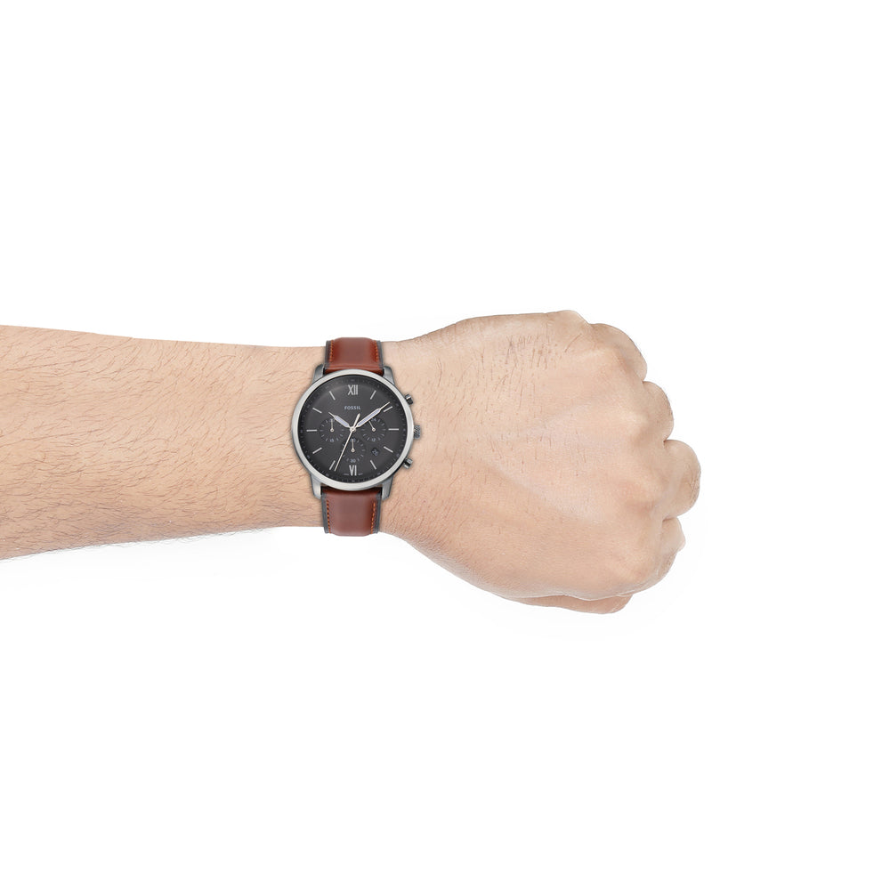 Fossil FS5512-10 watch on wrist with brown leather strap