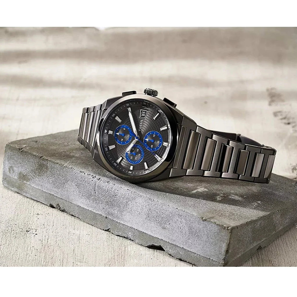 FS5830 watch with blue accents on concrete block