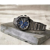 FS5830 watch with blue accents on concrete block