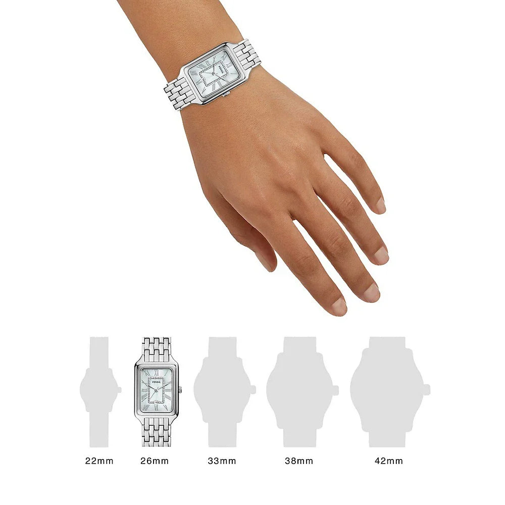 Silver rectangular watch on wrist with size comparison