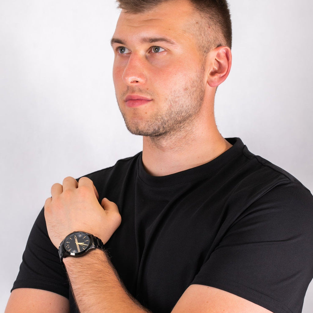 Man wearing Armani Exchange AX2413 men's watch