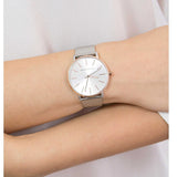 Silver watch on wrist, model 1600x