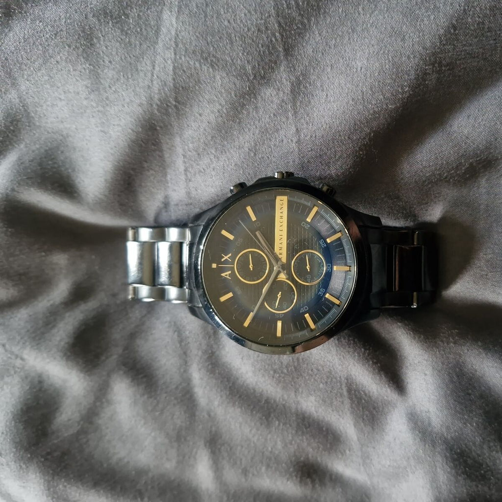 AX Armani Exchange watch on gray fabric