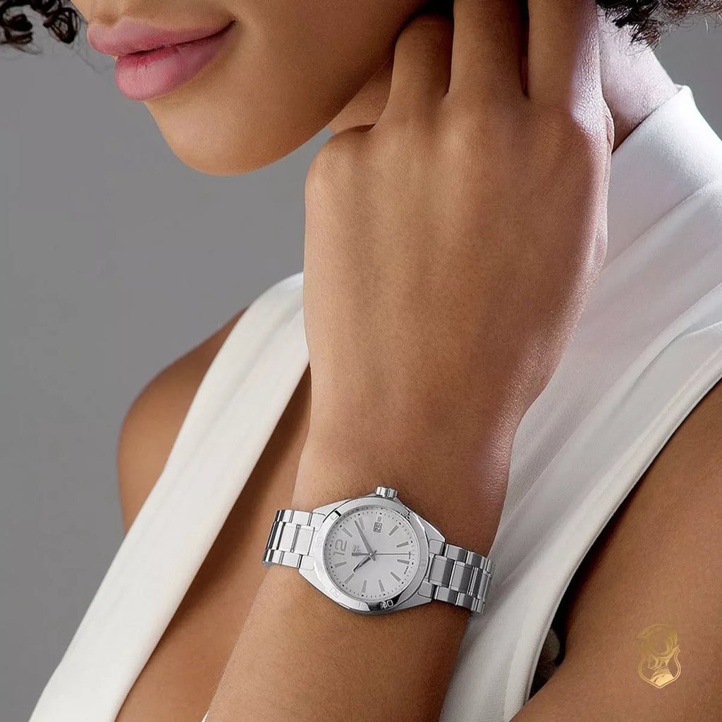 Woman wearing Tag Heuer Formula 1 quartz watch