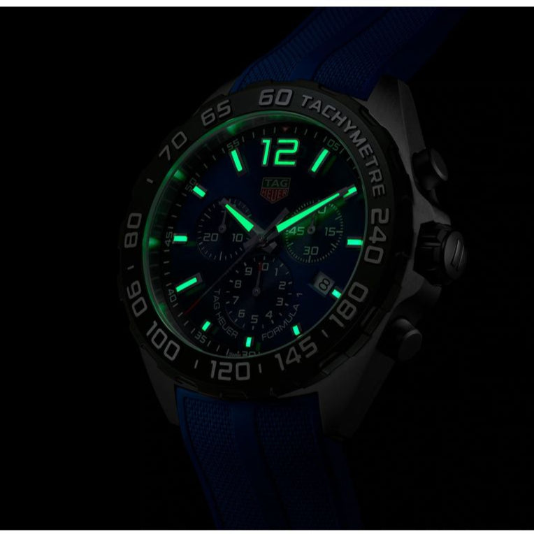 Tag Heuer Formula 1 Chronograph watch with glowing numerals.
