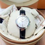 Tissot T Lady Flamingo Mother of Pearl White Dial Black Leather Strap Watch for Women - T094.210.16.111.00
