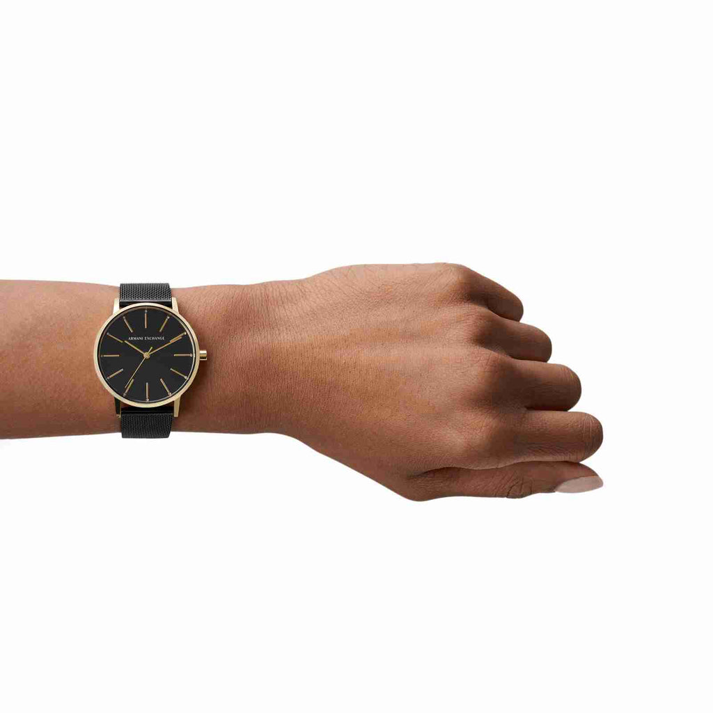 AX5548-3P black and gold wristwatch on wrist