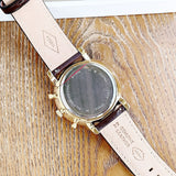 Fossil watch, brown leather strap, back view