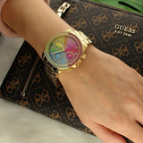 Guess Sol yellow gold rainbow watch on wrist