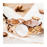 Rose gold Calvin Klein wristwatch.