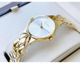 Calvin Klein gold watch, b754b602 design, on display.