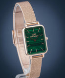 Rose gold watch with green face