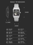 Silver rectangular wristwatch with black face.
