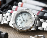 Tag Heuer Aquaracer watch with diamond accents