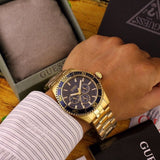 Guess Chaser Multifunction Blue Dial Gold Steel Strap Watch for Men - W0172G5