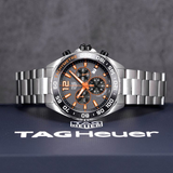 TAG Heuer watch with grey and orange accents