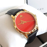 Gucci G Timeless Coral Red Dial Black Leather Strap Watch For Men - YA126464