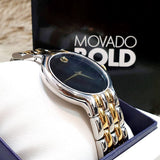 Movado Bold watch with black face and gold accents.