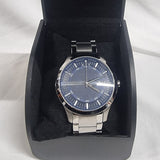 Silver wristwatch in a black box.