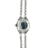 Stainless steel watch back view, captured May 4, 2023.