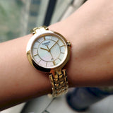 Tissot Flamingo Mother of Pearl Dial Gold Steel Strap Watch For Women - T094.210.33.111.00