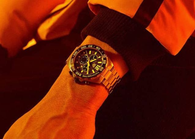 Grey watch on wrist