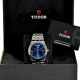 Tudor watch in box with guarantee card.