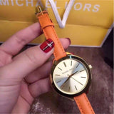 Michael Kors Runway Quartz Gold Dial Orange Leather Strap Watch For Women - MK2275