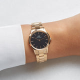 Daniel Wellington DW00100212 gold watch on wrist