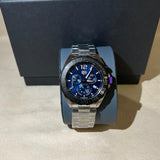 Silver wristwatch with blue face.