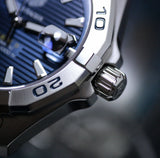 Close-up of luxury watch detail with blue face
