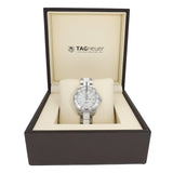 Silver Tag Heuer watch in a display box.