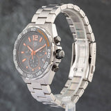 Tag Heuer watch with grey and orange details