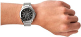 Silver AX watch on wrist
