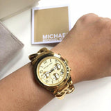 Michael Kors Runway Twist Gold Dial Gold Stainless Steel Strap Watch for Women - MK3131