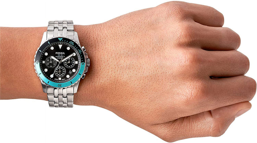 Fossil FB-01 Men's Watch FS5827 on wrist, silver band, black face, teal accents.
