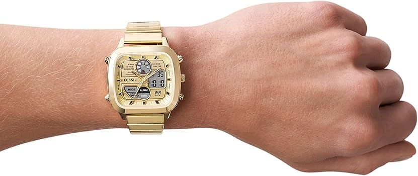 Gold watch on wrist