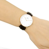Daniel Wellington watch on wrist, rose gold and leather.