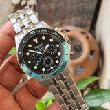 Fossil watch with black face and silver band