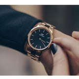 Daniel Wellington DW00100210 rose gold watch on wrist