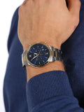 Detail of a Fossil watch on a wrist