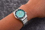 Seiko 5 Sports SKX Midi Automatic Teal Dial Silver Steel Strap Watch For Men - SRPK33K1