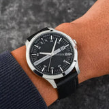 Armani Exchange watch detail on wrist