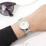 Silver watch on wrist