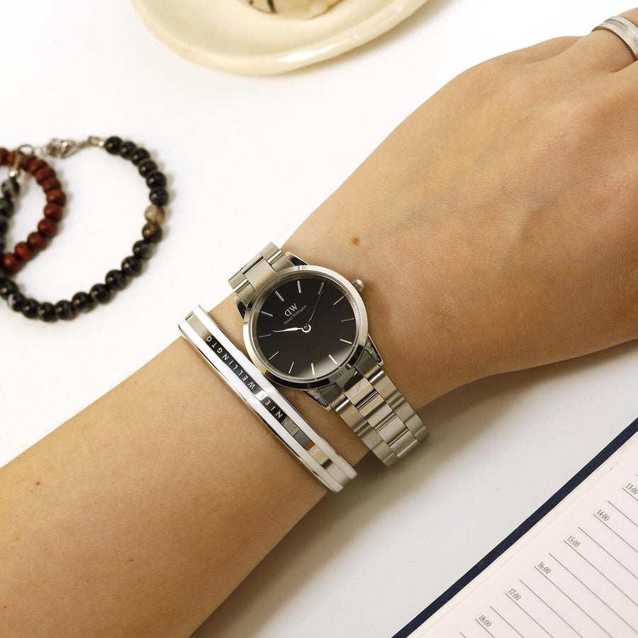 DW00100206__1 - Silver watch and bracelet on wrist