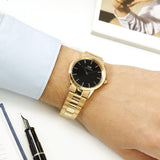 DW00100210 Gold Watch on Wrist