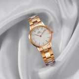 Daniel Wellington DW00100211-1-2 rose gold watch on white fabric