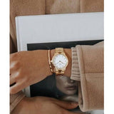 Daniel Wellington DW00100211-10 gold watch on wrist
