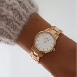 Daniel Wellington DW00100211-7 gold watch on wrist