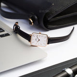DW00100434-5 Daniel Wellington watch on laptop